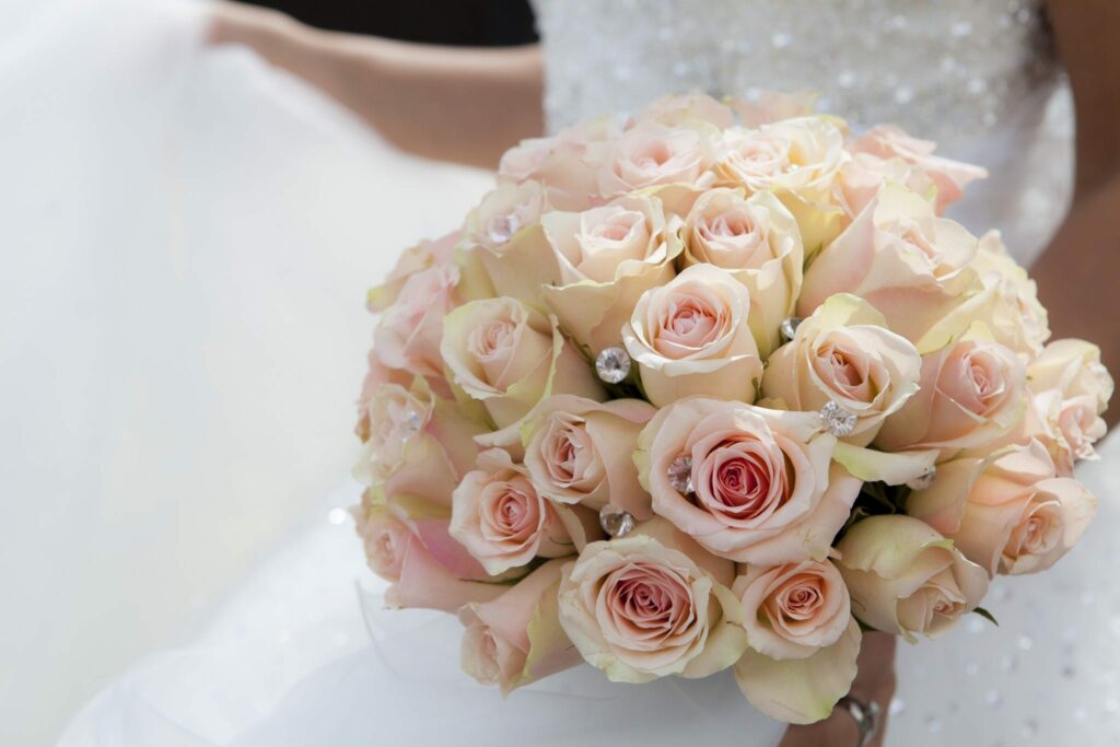 flowers, white roses, held by bride